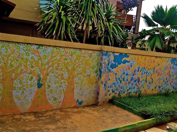 Handprints of patients and their children outside of the West Africa AIDS Foundation