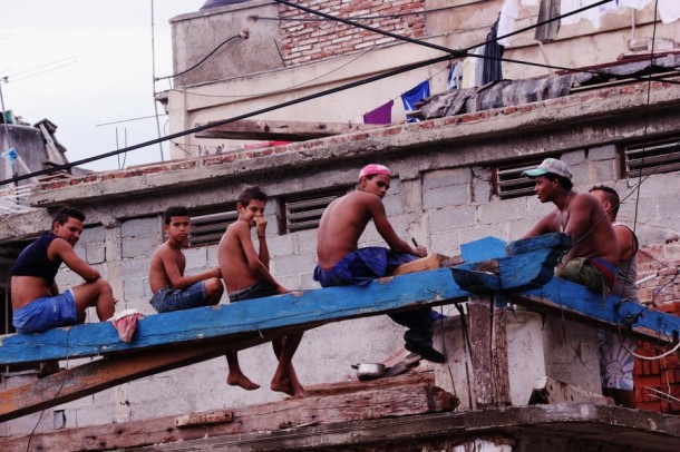 Cuba, Santiago, roof, boys