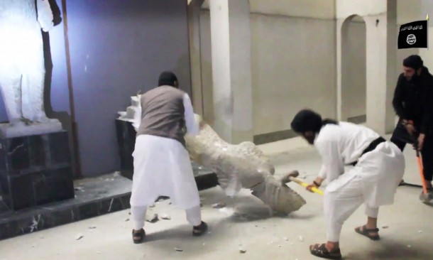 ISIS terrorists breaking a Sumerian sculpture in the museum of Mosul | via The Guardian