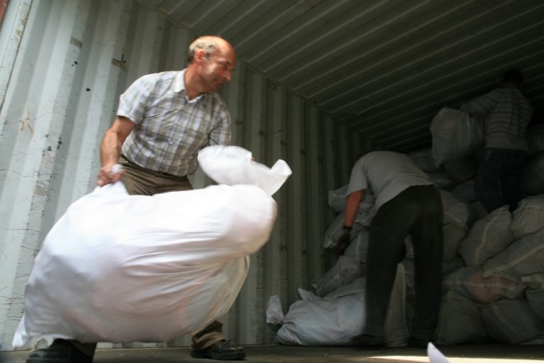 Supplies being loaded onto a truck