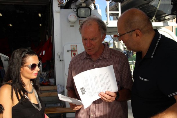 Puglian NO-TAP activists Caterina Vitiello and Angelo Consoli deliver NO-TAP decalogue to Captain of the Rainbow Warrior Joel Stewart. 