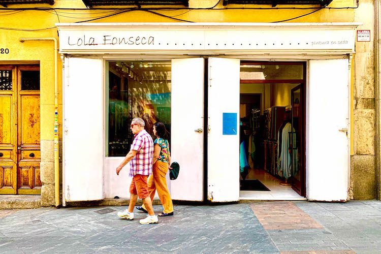 The storefront of Lola Fonseca, a shop that sells handcrafted custom designs by painting on silk on Calle de Cervantes in Madrid Spain, on July 24, 2019. | Bertha Smith